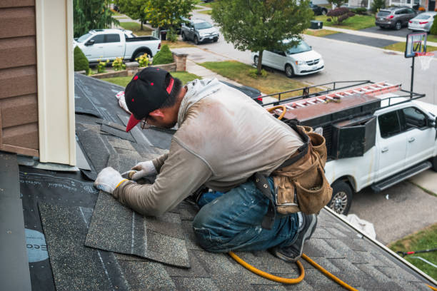 Professional Emergency Roof Repair technician working in Woonsocket, RI